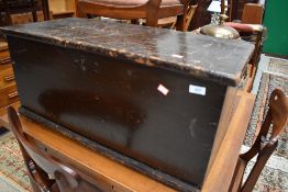 A traditional pine bedding or storage box of small size