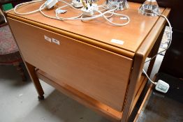 A G Plan styled tea trolley in a teak wood