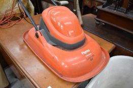 A modern Flymo turbo lite 330 garden lawn mower