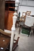 A vintage painted standard lamp