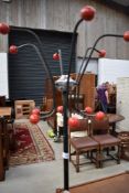A vintage mid century atomic styled hat and coat stand
