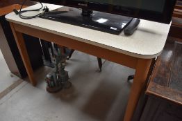 A vintage formica topped kitchen work table having rounded edges, approx 114 x 61cm, height 76cm