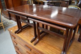 A mahogany effect coffee table nest
