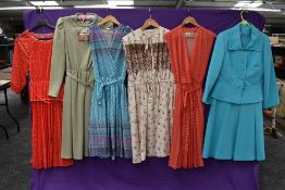 A mixed lot of vintage and retro dresses including one still having tags.predominantly 1970s,mixed