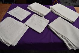 A variety of antique table linen including examples with intricate cut work, ladder work and