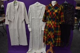 A mixed lot of clothing including 1960s wedding dress with lace detailing,tartan wool 1940s dress,