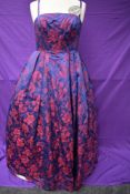 A 1950s Victor Josselyn gown in iridescent purple and red with hooped underskirt with box and