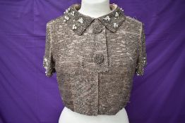 An antique richly beaded short jacket,around 1920s/30s.