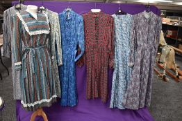 A selection of vintage and retro Ladies dresses in a variety of fabrics, patterns and styles.