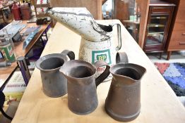 A collection of vintage oil jugs including BP.