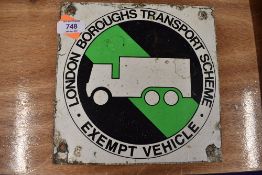 A small metal sign for London Boroughs Transport Scheme