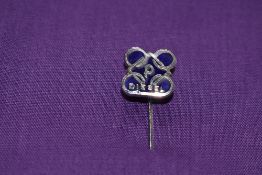 A Perkins lapel badge.