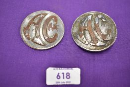 Two motor car engine badges for AC