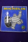 A vintage garage sign for Michelin Tyres