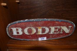 A cast iron Boden truck or similar motor sign