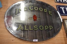 A vintage pub tavern advertising mirror for Ind Coope Allsopp brewery in original oval frame