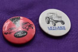 Landrover and Leyland lapel badges.