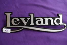 A new old stock Leyland badge.