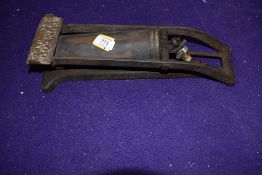 A vintage garage commercial foot pump