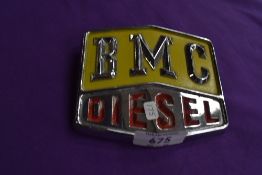 A BMC Diesel radiator badge.