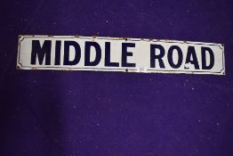 A vintage road side enamel sign reading Middle Road