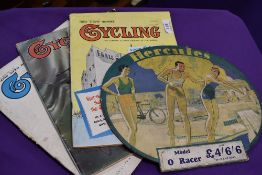 A selection of bicycle or cycling magazines and Hercules card sign