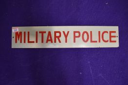 A vintage sign for the Military Police