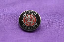An Austin Healey Lapel badge.