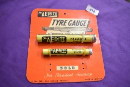 A vintage Aerite advertising card with tyre pressure gauges.