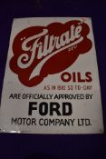 A genuine Vintage advertising sign for Filtrate Oils and Ford