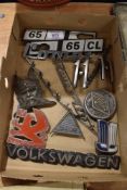 A selection of vintage garage motor car engine badges