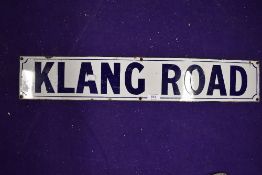 A vintage road side enamel sign reading Klang Road