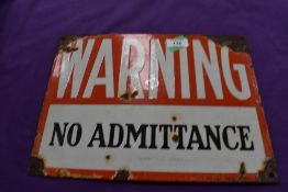 A vintage enamel garage sign for Warning No Admittance