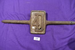 A cast metal motor car engine badge for Ford 4D