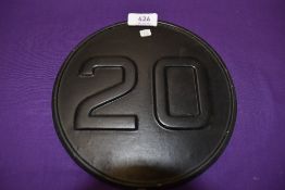 A small cast commercial 20mph rear badge