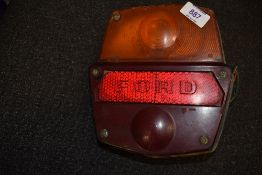 A vintage Ford motor car or truck rear light or lamp