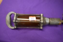 A vintage garage oil gun Non Drip Measure