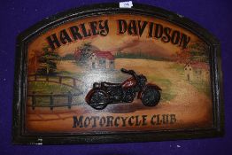 A modern wooden sign for Harley Davidson Motorcycle club