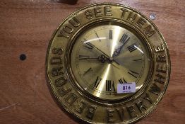 A vintage garage brass cast advertising clock for Bedford