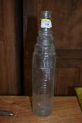 A vintage garage oil bottle for Esso Lube
