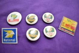 A quantity of Petrol lapel badges.