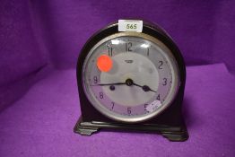 A mid century 8 day bakelite mantel clock