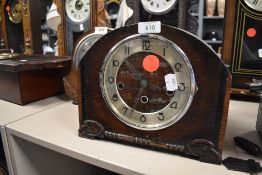 A mid century mantel clock