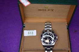 A gent's fashion wrist watch having black face bearing name Rolex