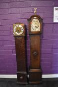 An Enfield Granddaughter clock and an oak bodied granddaughter clock with a quartz movement