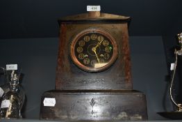 A Victorian gothic mantle clock having slate and marble case with brass and painted face by Mappin