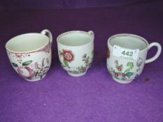 A pair of late 18th century Worcester style chocolate cups having floral pattern and burgundy