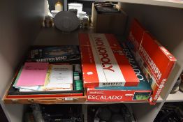 A selection of childrens toy and board games including Mah Jongg Monopoly and Escalado