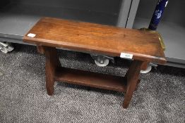 A traditional styled oak stool or step having pegged stetcher