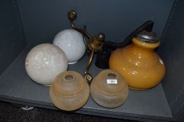 A selection of vintage light and lamp shades including milk glass brass fitment and Guzzini style
